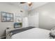 Bright bedroom with white finishes, closet, and TV at 2105 Fosgate Dr, Winter Park, FL 32789