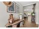 Inviting hallway with wood accents, decor, and dining room view at 2105 Fosgate Dr, Winter Park, FL 32789