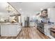 Full view of a well-appointed kitchen featuring stainless steel appliances, custom cabinetry, and a large island at 2105 Fosgate Dr, Winter Park, FL 32789