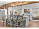 Spacious kitchen with a large island, pendant lighting, stainless steel appliances, and custom wood accents at 2105 Fosgate Dr, Winter Park, FL 32789
