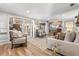 Bright living room boasts wood floors, neutral tones, and seamless transition to the outdoor area through glass doors at 2105 Fosgate Dr, Winter Park, FL 32789