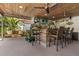Relaxing outdoor bar featuring seating, a golf cart, and a porch swing for relaxing evenings at 2105 Fosgate Dr, Winter Park, FL 32789
