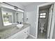 Bathroom with granite countertops, a bowl sink, and tile flooring at 211 Marion Oaks Ln, Ocala, FL 34473
