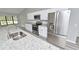 Bright kitchen with stainless steel appliances, granite countertops, and gray wood floors at 211 Marion Oaks Ln, Ocala, FL 34473