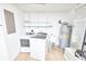 Bright laundry room features new washer and dryer hookups and a utility sink at 211 Marion Oaks Ln, Ocala, FL 34473