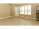 Bedroom featuring neutral walls, window shutters, laminate floors, and a ceiling fan at 212 Regency St, Davenport, FL 33896