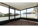 Enclosed patio featuring brick flooring and screen enclosure, great for outdoor living at 212 Regency St, Davenport, FL 33896