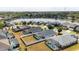 Aerial view of property near a lake, showcasing its desirable location and screened pool at 2709 Prestwick Ln, Kissimmee, FL 34744