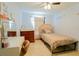 Cozy bedroom featuring a comfortable bed, ample natural light, and stylish decor that will be relaxing at 2709 Prestwick Ln, Kissimmee, FL 34744