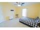 Bedroom featuring tile floors, a ceiling fan, and window at 2709 Prestwick Ln, Kissimmee, FL 34744