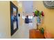 Open foyer with neutral walls, gleaming tile floor and decorative accents creates a lasting impression at 2709 Prestwick Ln, Kissimmee, FL 34744
