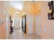 Bright foyer with tile flooring, high ceilings, and elegant lighting fixtures creating a welcoming entrance at 2709 Prestwick Ln, Kissimmee, FL 34744