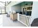 Covered patio area with outdoor seating and a convenient bar at 2709 Prestwick Ln, Kissimmee, FL 34744