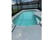 Inviting in-ground pool with crystal-clear water and a screened enclosure at 2709 Prestwick Ln, Kissimmee, FL 34744