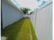 Side yard with lawn at 2709 Prestwick Ln, Kissimmee, FL 34744