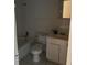 Bathroom with a bathtub, toilet, vanity, and tiled walls at 3040 Pinder Ct, Orlando, FL 32811
