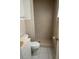 The bathroom has a white toilet and stand-up shower at 3040 Pinder Ct, Orlando, FL 32811