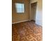 This bedroom offers a cozy space, enhanced by natural light streaming through the window at 3040 Pinder Ct, Orlando, FL 32811