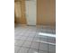 The floor features tile floors, a window and a cream-colored wall at 3040 Pinder Ct, Orlando, FL 32811