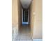 Hallway with tiled floors leading to other rooms in the house at 3040 Pinder Ct, Orlando, FL 32811