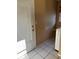 Laundry area featuring a door to the exterior and a washing machine at 3040 Pinder Ct, Orlando, FL 32811