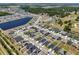 Panoramic view of a residential area with a beautiful lake and verdant surroundings at 3222 Sweet Acres Pl, St Cloud, FL 34772
