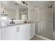Bathroom features granite counters, double sinks and a glass enclosed shower at 3222 Sweet Acres Pl, St Cloud, FL 34772