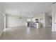 Bright kitchen featuring white cabinets, stainless steel appliances, granite countertops, and a center island with seating at 3222 Sweet Acres Pl, St Cloud, FL 34772