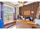 Home office with a window bench and a large window at 329 Alegriano Ct, Kissimmee, FL 34758