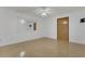 This bedroom features wood floors, a ceiling fan, and closet, offering a bright and neutral space at 334 Terrace Dr, Oviedo, FL 32765
