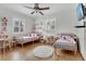 bedroom with hardwood floors and bright, natural light at 334 Terrace Dr, Oviedo, FL 32765