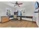 Bedroom featuring hardwood floors and a ceiling fan at 334 Terrace Dr, Oviedo, FL 32765