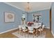 Dining room area with bright light fixture, table, and chairs at 334 Terrace Dr, Oviedo, FL 32765