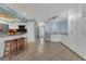 Bright eat-in kitchen featuring granite counters, white cabinets, and tiled floors at 334 Terrace Dr, Oviedo, FL 32765