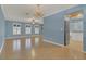 The open concept living and kitchen area offers hardwood floors and plenty of light at 334 Terrace Dr, Oviedo, FL 32765