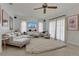 Bright living room featuring neutral decor, a plush rug, and plenty of natural light from large windows at 334 Terrace Dr, Oviedo, FL 32765