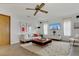 Bright living room with modern furnishings, a cozy rug, and natural light from the large windows at 334 Terrace Dr, Oviedo, FL 32765
