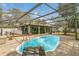 Enjoy the private screened-in pool and outdoor living space, perfect for relaxation and entertainment at 334 Terrace Dr, Oviedo, FL 32765