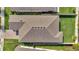 An aerial view of the home's roof, back yard, and driveway at 338 Wooded Vine Dr, Winter Springs, FL 32708