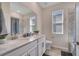 Bright bathroom with a double sink vanity, modern fixtures, and ample natural light for a refreshing experience at 338 Wooded Vine Dr, Winter Springs, FL 32708