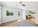 Sitting room with pool view, neutral color palette, and access to the backyard at 3520 Sebring Ave, Orlando, FL 32806