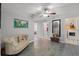 Hallway features doorways to the bedrooms and laundry room with warm natural light at 4027 Lakeside Reserve Ct, Orlando, FL 32810