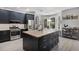 Kitchen with island, stainless steel appliances, and light countertops at 4027 Lakeside Reserve Ct, Orlando, FL 32810