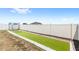 Backyard putting green provides opportunity for relaxing and convenient golf practice at 4215 Swan St, Haines City, FL 33844