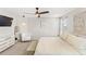 Spacious main bedroom features a ceiling fan and decoratively painted walls at 4215 Swan St, Haines City, FL 33844