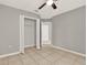 Bedroom with tile flooring, closet, and neutral paint color at 4347 Creekside Blvd, Kissimmee, FL 34746