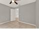 Spacious bedroom with tile flooring, doorway, and natural light at 4347 Creekside Blvd, Kissimmee, FL 34746