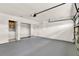 Garage with washer, dryer, closet, and painted concrete floor at 4347 Creekside Blvd, Kissimmee, FL 34746
