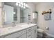 Bathroom featuring double sinks with vanity, large mirror, and recessed lighting at 4591 Gliding Wave St, Winter Garden, FL 34787