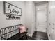 Hallway with a bench, coat rack, and decorations on the wall at 4591 Gliding Wave St, Winter Garden, FL 34787